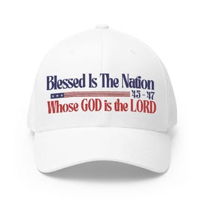 May include: White baseball cap with the text "Blessed is the Nation Whose GOD is the LORD" in blue and red lettering. The text also includes a small American flag graphic and the scripture reference "45-47".