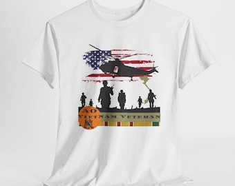 May include: White t-shirt with a black silhouette of a helicopter flying over a waving American flag. Below the helicopter are five soldiers in silhouette. The text "AO VIETNAM VETERAN" is printed below the soldiers.