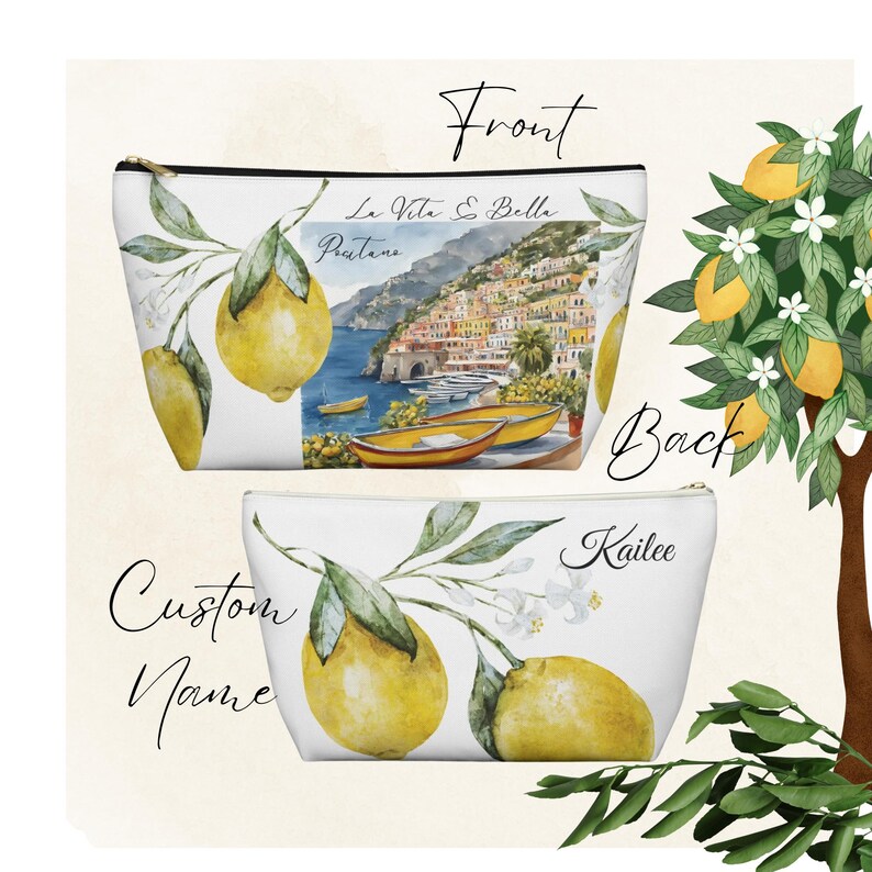 May include: White cosmetic bag with a watercolor design featuring lemons and a coastal Italian town. The front of the bag has the text "La Vita &egrave; Bella Positano". The back of the bag has the name "Kailee".