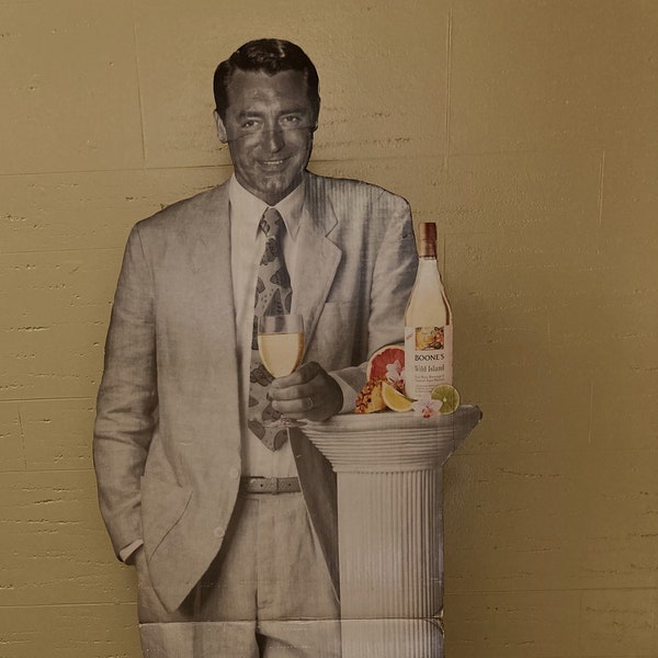 A vintage life-size standee of film-star Cary Grant. A rare item of movie memorabilia.