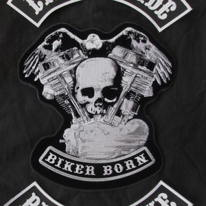 May include: Black and white embroidered motorcycle patches with the text "Live to Ride", "Biker Born", and "Ride to Live".