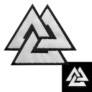 May include: A black and white embroidered patch featuring a triple triangle symbol, also known as the Valknut, a symbol from Norse mythology.