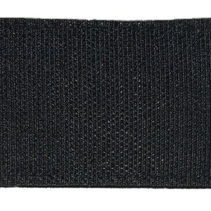 May include: Black hook and loop fastener patch. The patch is made of a textured fabric.