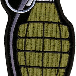 May include: A green and black embroidered patch of a grenade with a pull pin. The grenade is a common military symbol.