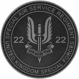 May include: A circular black and grey patch featuring the text "UNITED SPECIAL AIR SERVICE REGIMENT FORCES" and "UNITED KINGDOM SPECIAL FORCES". The patch has a winged dagger emblem, the number "22", and the motto "WHO DARES WINS".