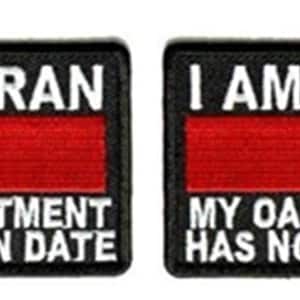 May include: Two black patches with white text that reads "I am a Veteran. My oath of enlistment has no expiration date." Each patch has a red, white, and yellow stripe.