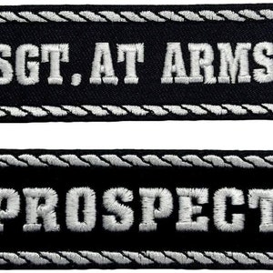 May include: Two black embroidered patches with white stitching. The top patch reads "SGT. AT ARMS" and the bottom patch reads "PROSPECT".