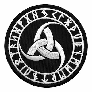 May include: Black and white embroidered patch with a white Valknut symbol surrounded by a circle of white runes.