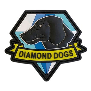 May include: A black and yellow patch with a diamond shape and a black dog's head inside. The text "DIAMOND DOGS" is on a yellow banner below the dog's head.