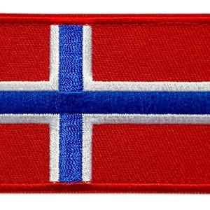 Peut inclure: Un patch brodé représentant le drapeau de la Norvège, avec les couleurs rouge, blanc et bleu.