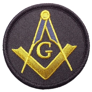 May include: A black embroidered patch with a gold Masonic symbol, including a compass and square, and the letter "G" in the center.
