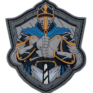 May include: A gray and blue embroidered patch featuring a knight in armor holding a sword. The knight is wearing a blue cape and a gold helmet. The patch is surrounded by a gray shield.