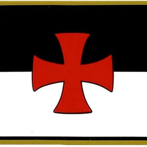 May include: A black and white flag with a red cross in the center. The flag is bordered in gold.