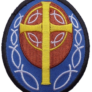 May include: An embroidered patch featuring a yellow cross on a red circle, surrounded by a white wreath of fish symbols on a blue background. The patch is outlined in black.