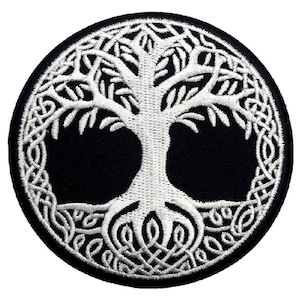 May include: White embroidered tree of life patch on a black background. The tree is surrounded by a Celtic knot design.