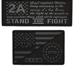 May include: Black and gray embroidered patch with the text "2A" and the quote "A well regulated Militia, being necessary to the security of a free State, the right of the people to keep and bear Arms, shall not be infringed STAND AND FIGHT". The bottom patch features a stylized American flag with a snake and the text "WHEN TYRANNY BECOMES LAW REBELLION BECOMES DUTY 1776 D.T.O.M"