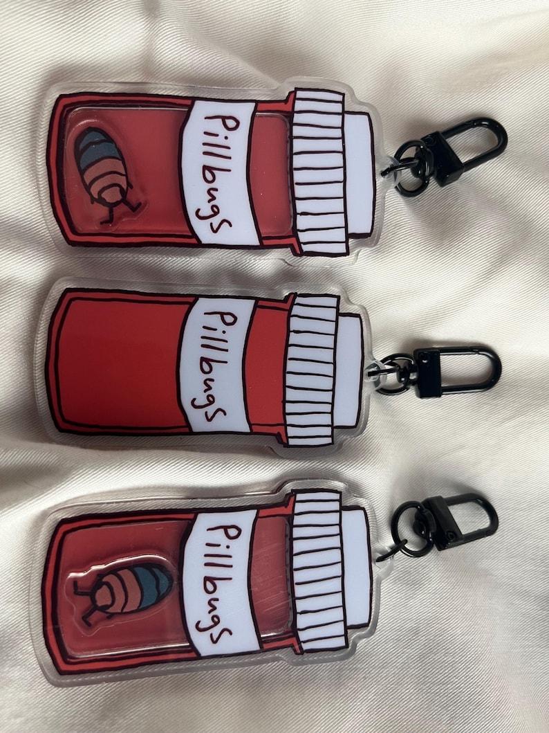 May include: A set of three ceramic mugs with a speckled, matte finish in cream, light grey, and dark grey. Each mug has a simple, minimalist design and a rounded handle.