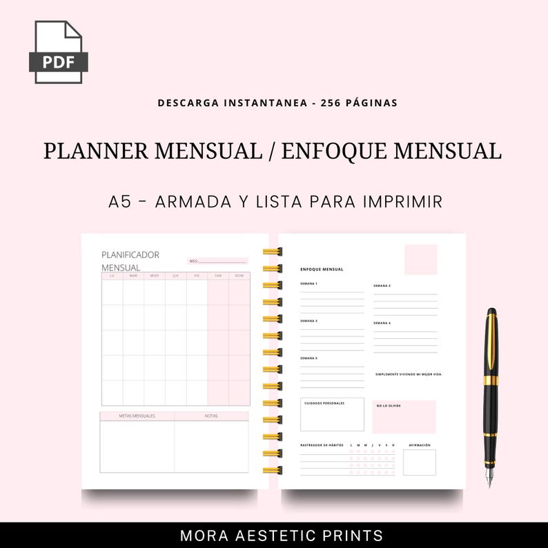 Puede incluir: Un planificador mensual A5, encuadernado en espiral, con un dise&ntilde;o rosa y blanco. Incluye un calendario mensual y secciones para el enfoque semanal. Tambi&eacute;n incluye un bol&iacute;grafo negro y dorado. Texto: "PLANNER MENSUAL / ENFOQUE MENSUAL".