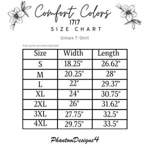 May include: A white size chart for Comfort Colors 1717 unisex t-shirts. The chart includes measurements for width and length in inches for sizes S through 4XL. The text "Size up for an oversized look" is also included.