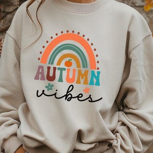 Autumn Rainbow Sweatshirt Pumpkin Design Cozy Fall Apparel Perfect for Thanksgiving Seasonal Fashion Gift for Her