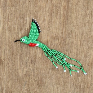 Beaded hummingbird pattern (green, red, and white)