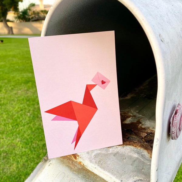 Postcard: an origami bird holding an envelope with a heart / matches 2024 love stamp