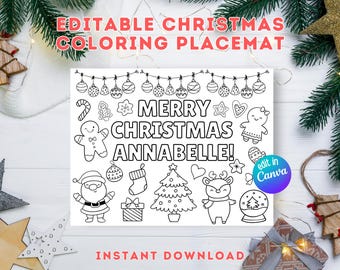 May include: A rectangular white paper placemat featuring black line art for coloring, including Christmas ornaments, a gingerbread person, Santa Claus, a tree, and a reindeer. The text reads MERRY CHRISTMAS ANNABELLE! with an edit in Canva circle.