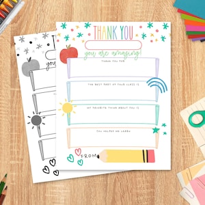May include: Two colorful teacher appreciation cards with the words "Thank You" and "You are amazing!" printed on them. The cards have fill-in-the-blank sections and are decorated with illustrations of an apple, sun, and pencil.