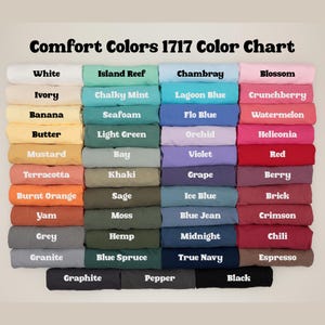 May include: A color chart titled "Comfort Colors 1717 Color Chart" displays a variety of fabric colors. The chart includes shades like white, ivory, banana, butter, mustard, terracotta, burnt orange, yam, grey, and granite.