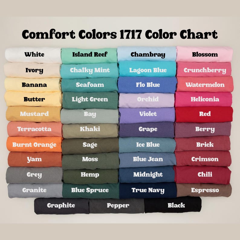 May include: A color chart titled "Comfort Colors 1717 Color Chart" displays a variety of fabric colors. The chart includes shades like white, ivory, banana, butter, mustard, terracotta, burnt orange, yam, grey, and granite.