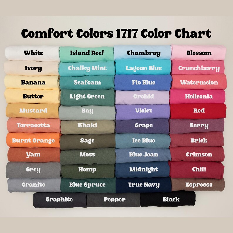 May include: A color chart titled "Comfort Colors 1717 Color Chart" displays a variety of fabric colors. The chart includes shades like white, ivory, banana, butter, mustard, terracotta, burnt orange, yam, grey, and granite.