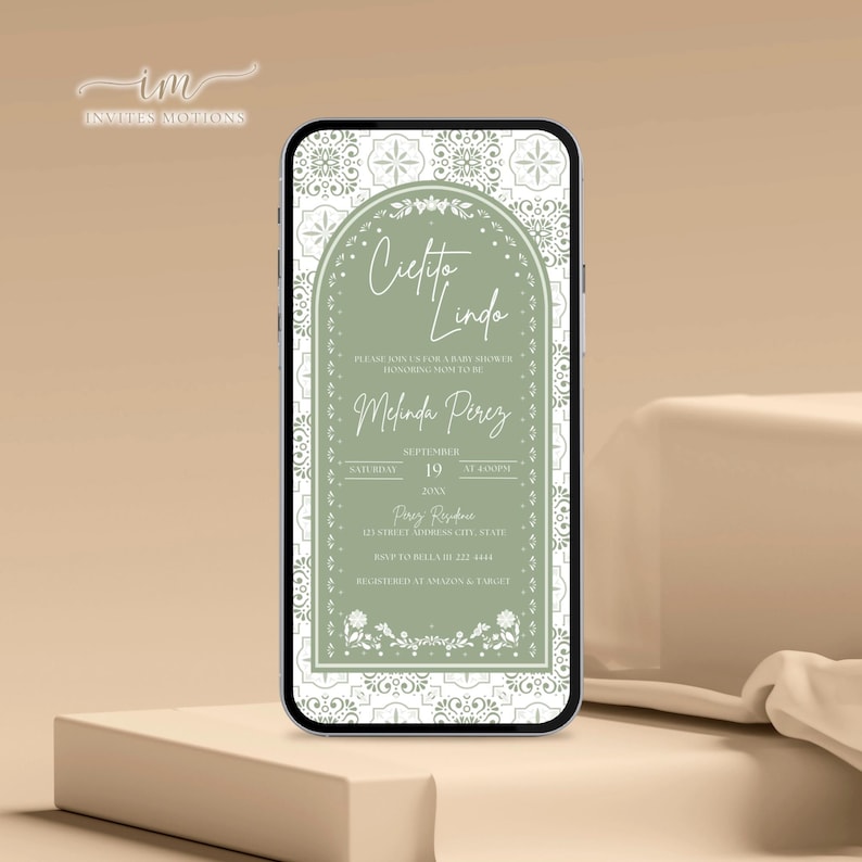 May include: A smartphone screen shows a baby shower invitation with the words "Cielito Lindo". The invitation has a green and white floral design, with event details including the date, time, and location, displayed in a decorative font.