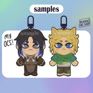 May include: Two cartoon character keychains with black metal clasps. One character has black hair with blue highlights and a brown outfit. The other has blonde hair and a green and brown outfit. The word "samples" is at the top.