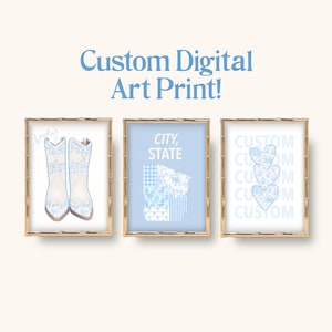 May include: Three framed art prints with gold bamboo-style frames. The prints feature a pair of cowboy boots, a state map with "City, State" text, and three heart shapes. The text "Custom Digital Art Print!" is at the top.