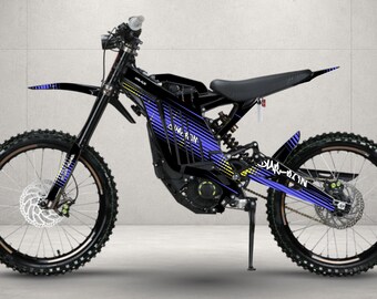 May include: A black electric dirt bike featuring a sleek frame with blue and yellow graphic accents. The bike includes a front fender, a black seat, a kickstand, and disc brakes on both wheels. The word Sur-Ron is printed on the frame and rear fender.
