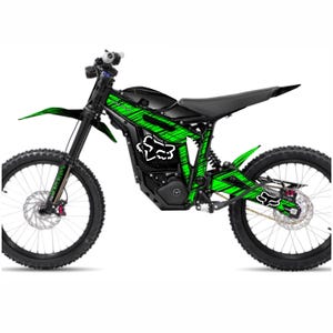 May include: Black and green electric dirt bike with a Fox Racing logo on the side. The bike has a black frame, black wheels, and green graphics.