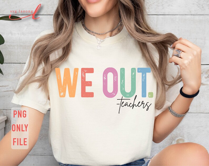 May include: A white t-shirt with the text "WE OUT. Teachers" in rainbow colors. The text has a distressed, vintage look.
