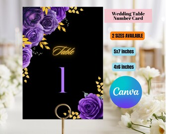 May include: A black wedding table number card with purple roses and gold accents. The card features the word "Table" in gold script and the number "1" in purple. The card is available in 5x7 and 4x6 inch sizes.