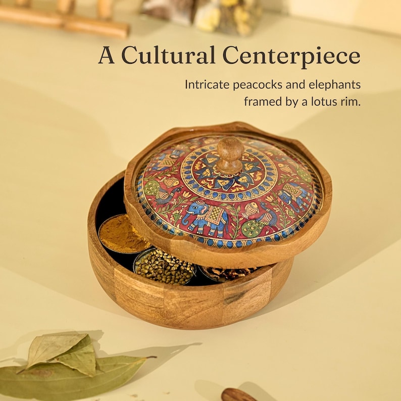 May include: A wooden centerpiece with a decorative lid featuring intricate peacock and elephant designs. The lid is framed by a lotus rim. The text on the image reads "A Cultural Centerpiece".