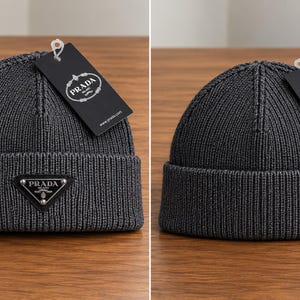 Può includere: Un berretto in maglia a coste grigio scuro con risvolto e una placca logo triangolare in metallo nero e argento sul davanti. Un'etichetta rettangolare nera con il logo Prada Milano è fissata sulla parte superiore con un sigillo in plastica.