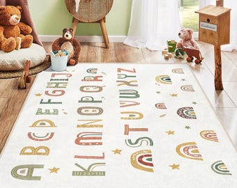 May include: A white alphabet play rug with colorful letters, rainbows, and stars. The rug is perfect for a child's playroom or bedroom.