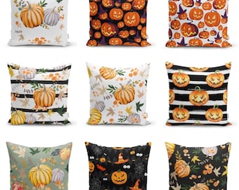May include: Set of ten Halloween-themed throw pillow covers featuring various pumpkin designs. The pillows have a variety of patterns, including stripes, polka dots, and floral designs. The pumpkins are orange and have different facial expressions.