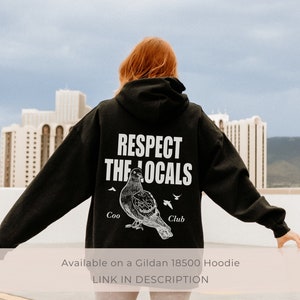 May include: Black hoodie with a white graphic print of a pigeon and the text "RESPECT THE LOCALS" with the words "Coo" and "Club" below the pigeon.