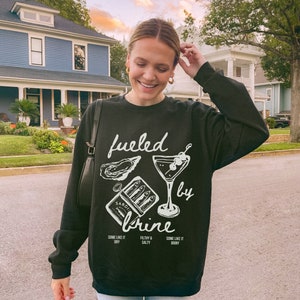 fueled by brine. Dirty martini sweatshirt.