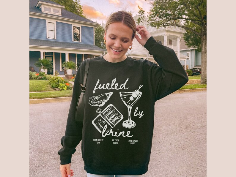 fueled by brine. Dirty martini sweatshirt.