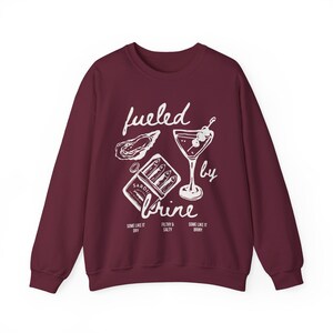 fueled by brine. Dirty martini sweatshirt.