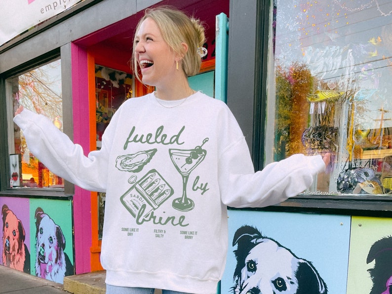 fueled by brine. Dirty martini sweatshirt.