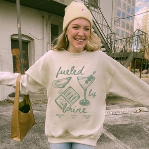 fueled by brine. Dirty martini sweatshirt.