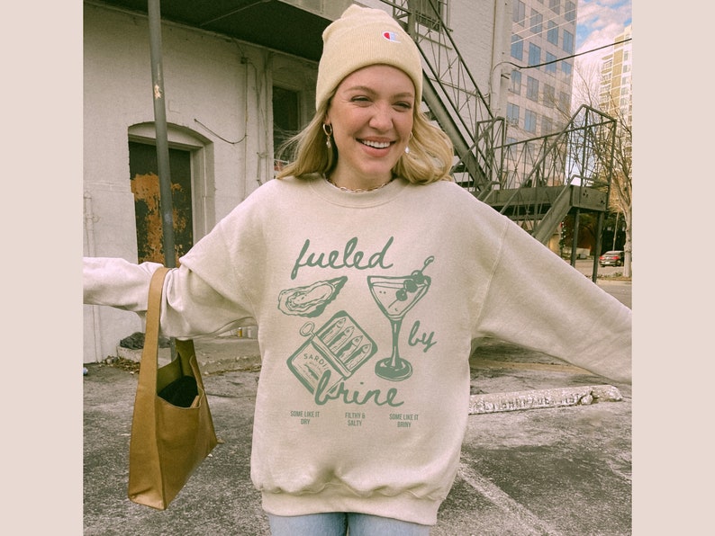 fueled by brine. Dirty martini sweatshirt.