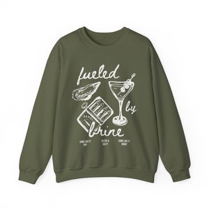 fueled by brine. Dirty martini sweatshirt.